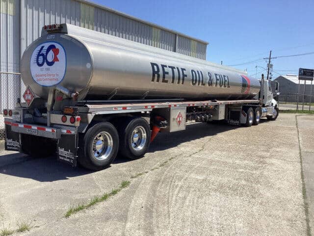 Fuel vehicle with Retif Oil & Fuel on the side.